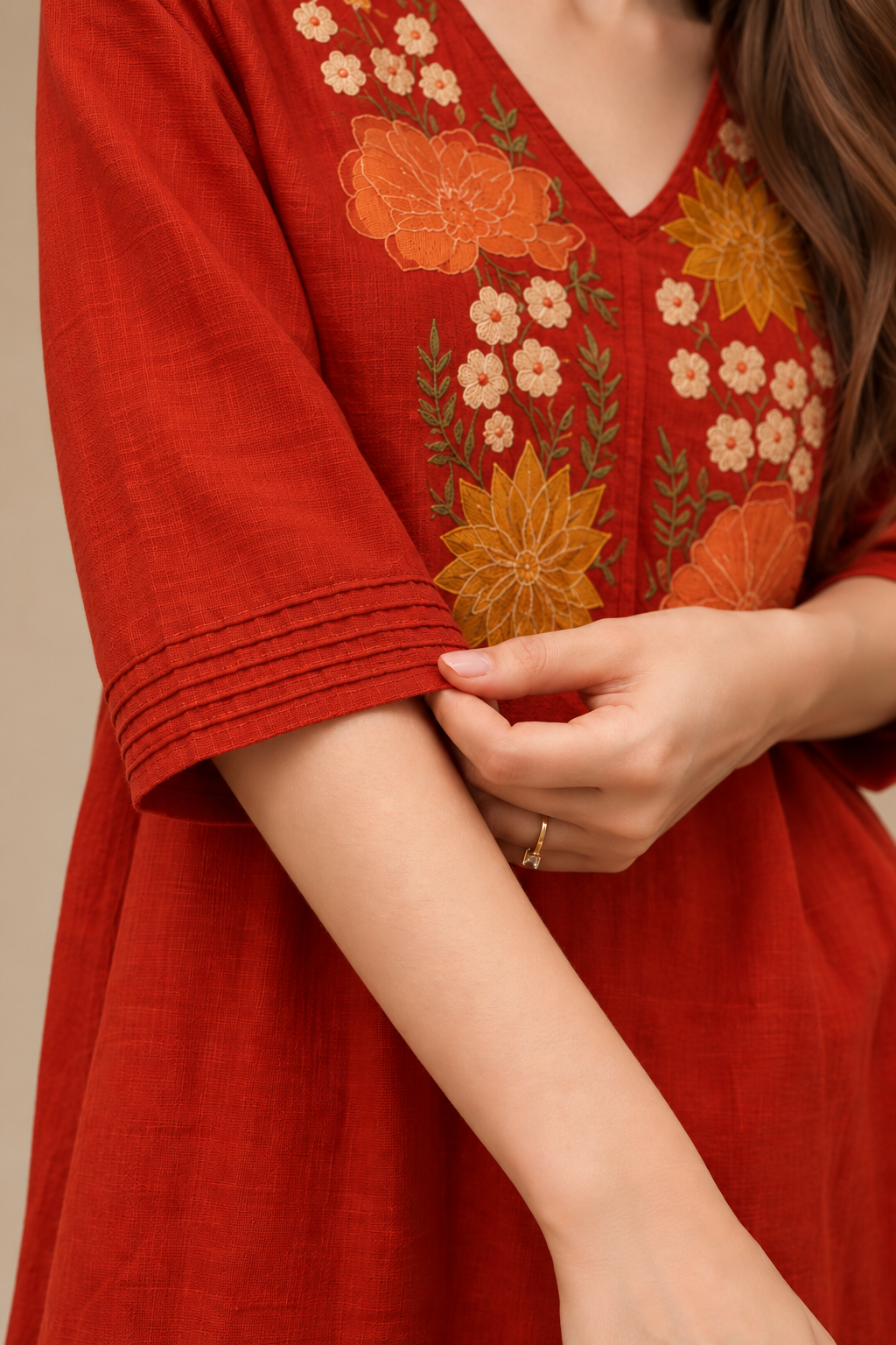 Beautiful rust-colored embroidered kurta with bell sleeves and matching wide-leg palazzo pants.