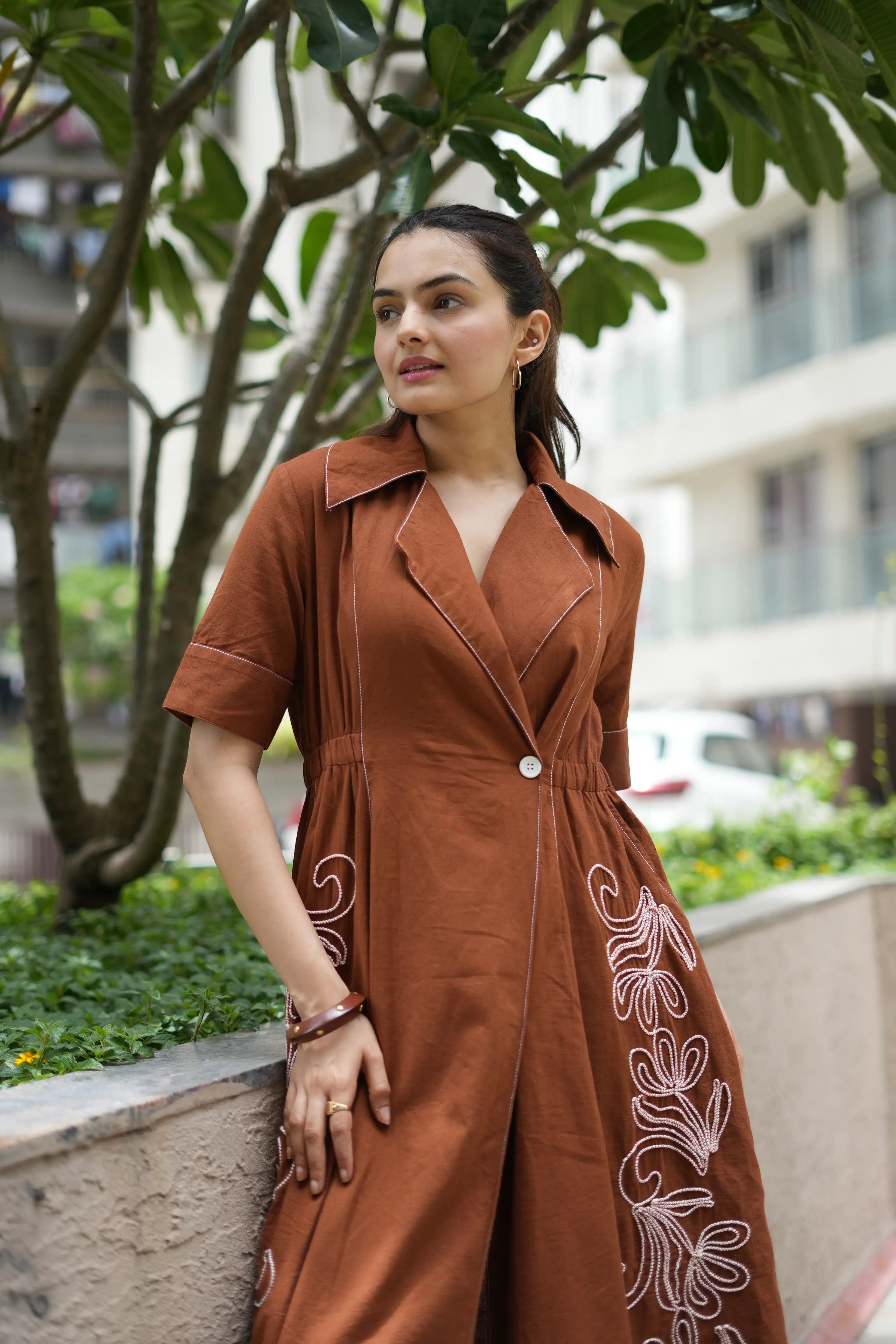 Half sleeves and a flattering A-line silhouette offer effortless everyday elegance.