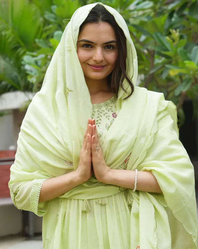 Matching embroidered dupatta enhances the overall outfit beautifully